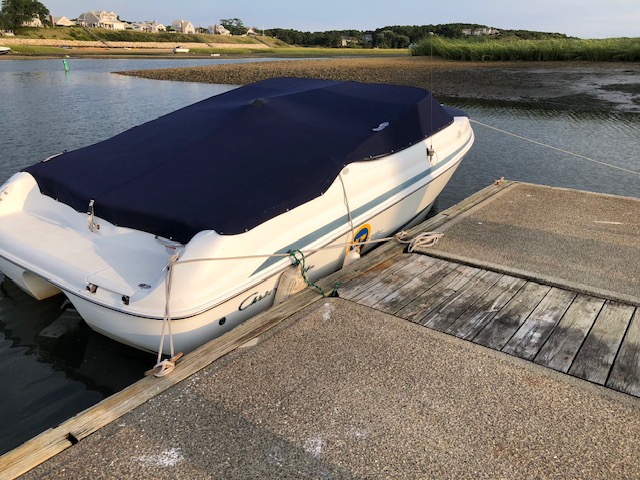 Chris-craft tied to dock