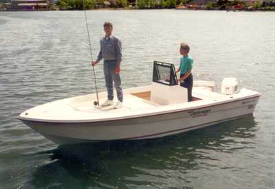 19' Alcar boat in the water