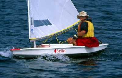 A Sunfish boat underway